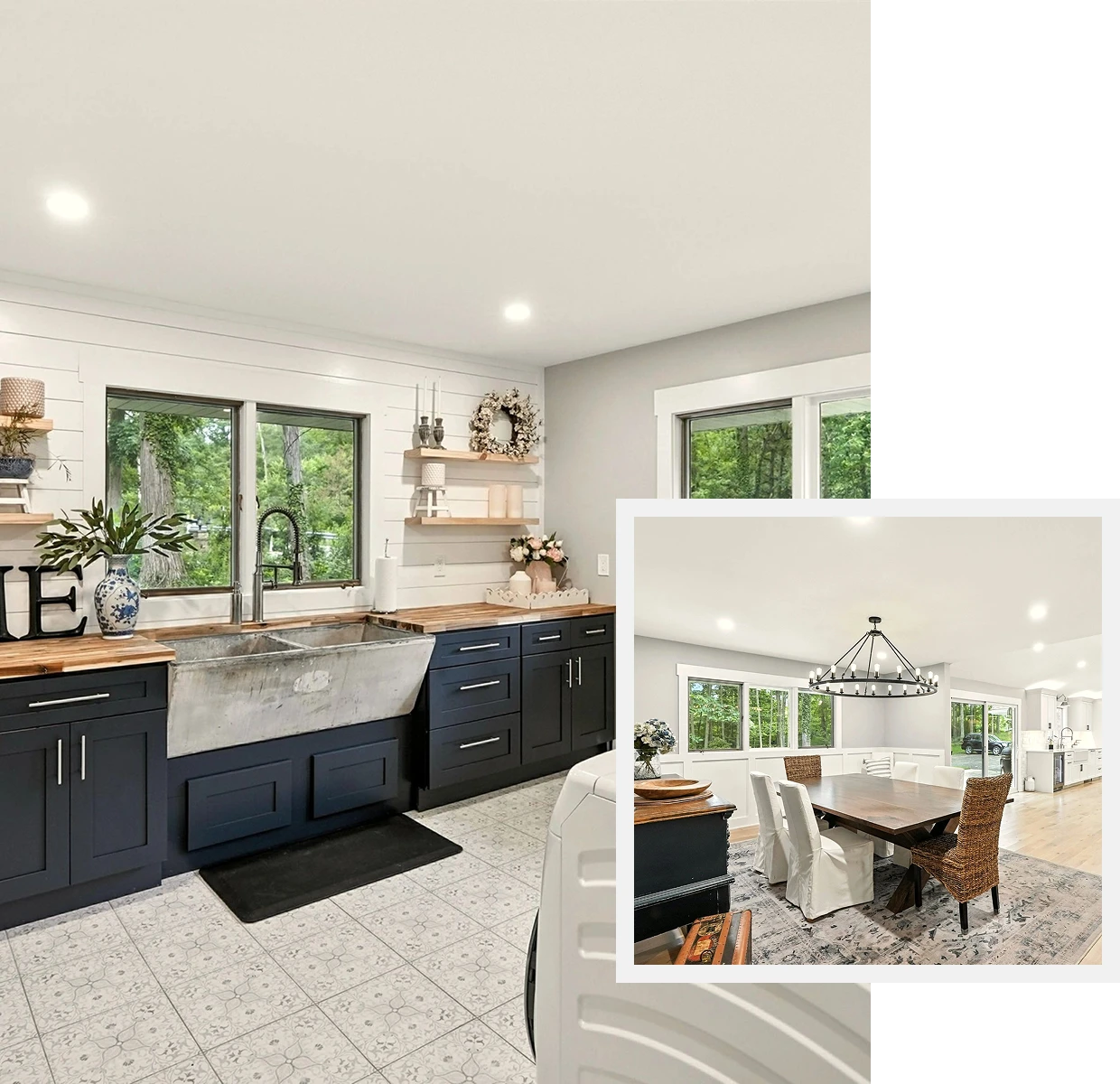 Bright modern kitchen with black cabinets and large windows.